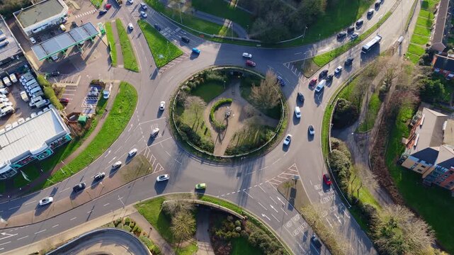 Static aerial view of a busy traffic roundabout with cars moving in Basildon, UK