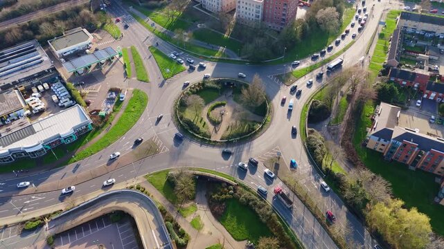 Aerial view of traffic circling a busy roundabout in Basildon, Essex, United Kingdom