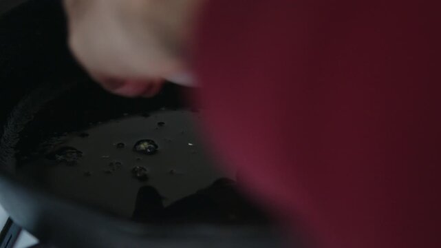 Closeup of an Egg Frying in a Pan