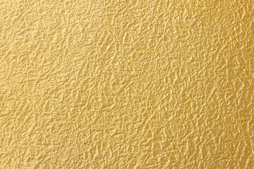 金色の揉み和紙の質感がある和風背景テクスチャ素材　Golden momigami washi paper texture and Japanese style background
