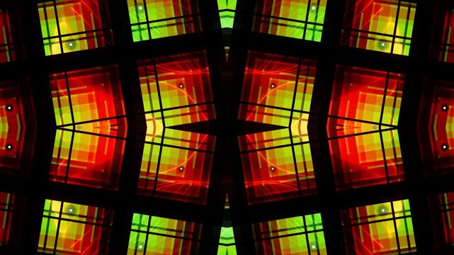 Symmetrical abstract pattern of glowing red and green squares with dark grid lines.