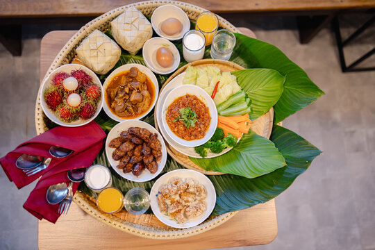 Authentic Northern Thai Khantoke Meal Served in a Traditional Ryokan Setting Representing Cultural Fusion and Abundance