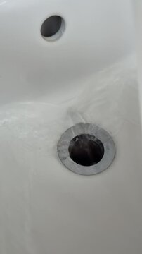 water flowing into a sink