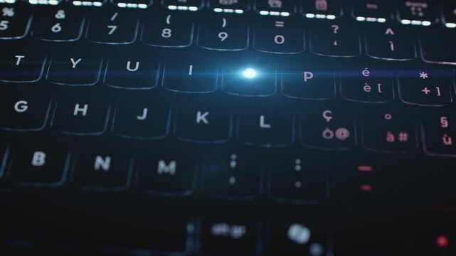 Close-up of illuminated computer keyboard keys in low light with blue backlighting. Vibe coding background concept with a key glows as AI driven content. Computer laptop modern keyboard