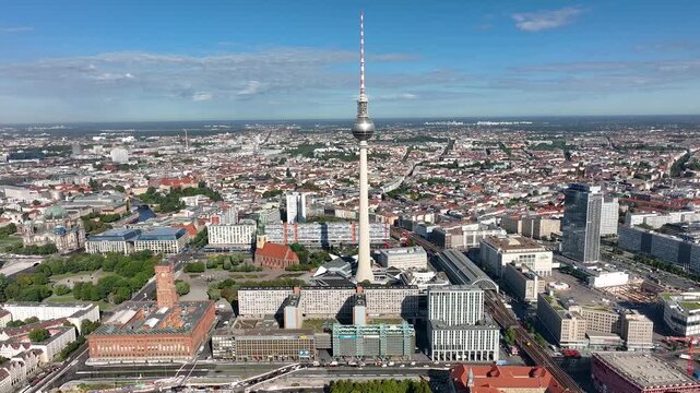 City of Berlin, Germany from above.Aerial view of cityscape showing architectural landmarks Fernsehturm TV Tower and Berlin Cathedral by day. Drone Flight over Alexanderplatz TV Tower, Sunflairs circa