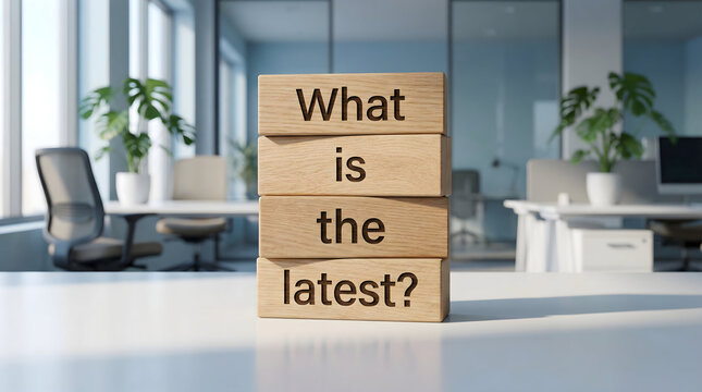 What Is The Latest Message on Stacked Wooden Blocks in Office