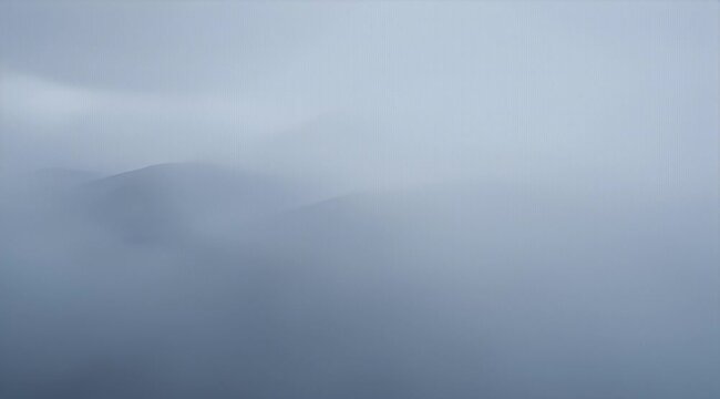 Misty mountain landscape with subdued light and minimalist atmosphere a serene view