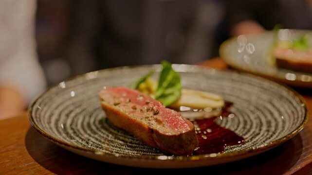 A gourmet dinner at a restaurant. Gastronomic food and dishes. Decorations and sophistication of signature dishes from the chef. Food as art. Bright colors of the dishes.