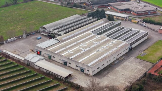 Industrial Complex Aerial View: An expansive aerial perspective of an industrial complex