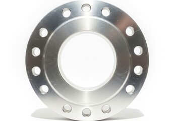 A close-up view of a large, metallic, circular object with multiple holes isolated on white background