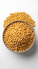 Fototapeta premium Chana Dal - Split Chickpeas in a Bowl on White Background.