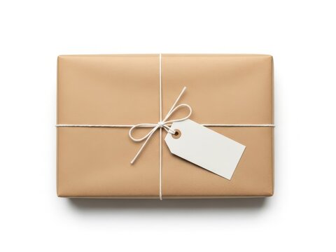 Brown paper package tied with string and a gift tag ready for delivery