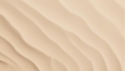 Fototapeta premium Close-up of soft beige sand dunes, wavy patterns, and subtle highlights under diffused light