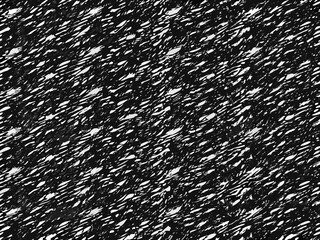 Abstract black and white scribble pattern resembling chaotic snowfall