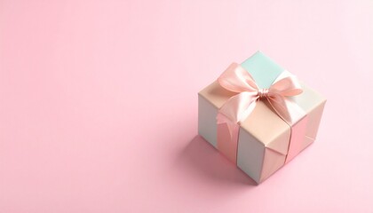Fototapeta premium Single pastel gift box with satin ribbon, copy space, minimal composition