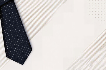 左側に紺色のネクタイを配置した父の日やビジネスの広告に使いやすい白背景のコピースペース素材