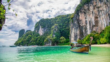 Pristine Ko Lao Bile Beach in Thailand with crystal-clear waters and untouched nature