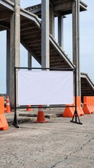 Fototapeta premium Blank white billboard mockup for advertising at an outdoor construction site.