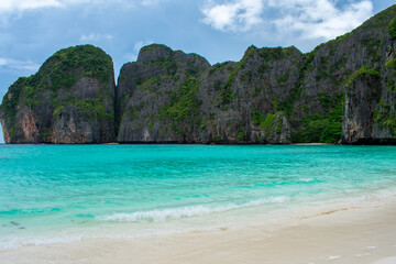 Fototapeta premium View of famous Maya Bay, Thailand. One of the most popular beach in the world. Ko Phi Phi islands. Beach without people.