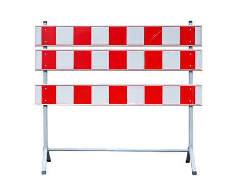 Red and white striped barricade on metal stand