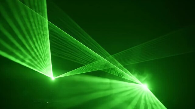 Green laser beams fan out from two bright points, creating a dynamic, abstract visual effect
