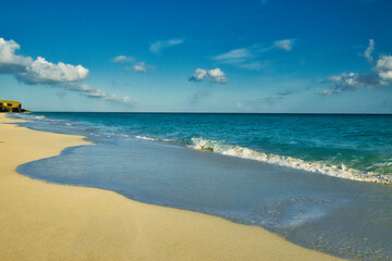 Fototapeta premium Varadero, Cuba; 04.07.2023. Beautiful, colourful sunset on the beach in Varadero, Cuba! Cote d'Azur of the Atlantic Ocean, next to the Caribbean Sea. Cuba wild palm beach background. Nature blue sea l