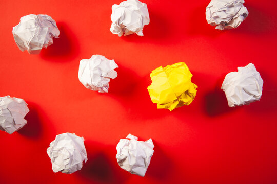 crumpled paper on the yellow background
