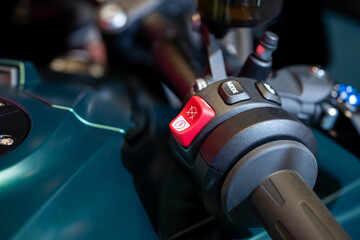 Fototapeta premium Close up of motorcycle handlebar control buttons