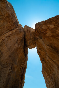 bolder sitting atop two larger bolders in The City of Rocks state park New Mexico
