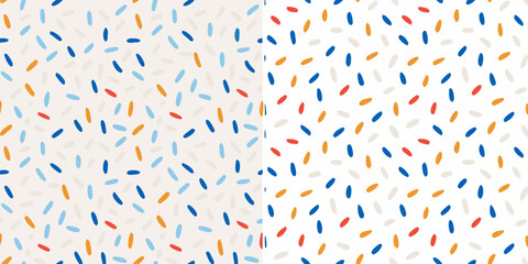 Colorful confetti pattern fills the frame with abstract shapes