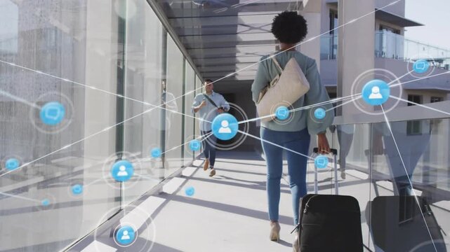 Woman pulling suitcase approaching man on bridge, blue icons expanding linking users for travel