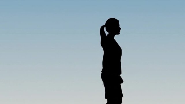 Businessman silhouette walking video seamless loop video