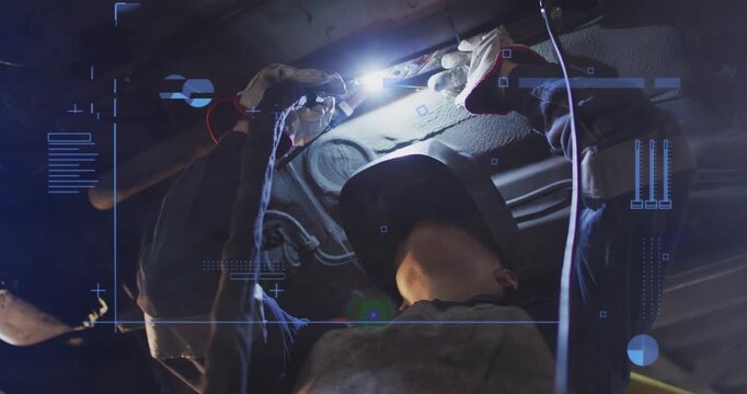 Woman mechanic raising work light, tightening fasteners under car, HUD overlays guiding repair