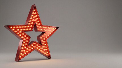 Obraz premium red metal star with glowing light bulbs on grey background. retro marquee sign decoration. christmas and new year holiday ornament. showbiz, cinema and fame symbol. banner, website header.