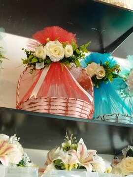 Decorative Gift Baskets Wrapped in Tulle with Artificial White Roses