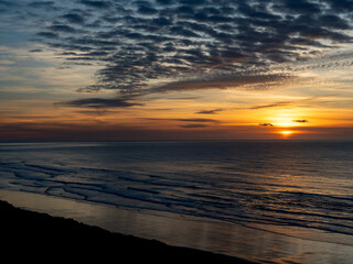 Obraz premium Beautiful sunset off of the Oregon coast and beach