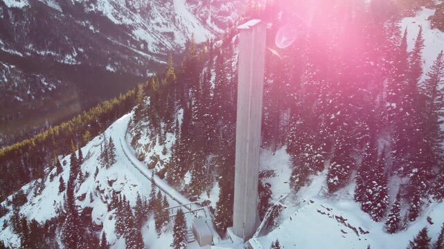 Concrete silo in snowy mountains 
