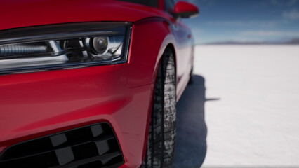 A vibrant red car is captured close to the ground, showcasing its sleek design and detailed features.