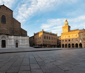 Bologna, Italy. Piazza Maggiore with Torre dell'Orologio and Torre dell’Arengo, landmark in Emilia-Romagna historical province. © xamnex