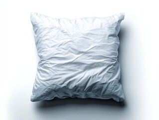 Obraz premium Wrinkled white pillow isolated on a clean backdrop for conceptual design