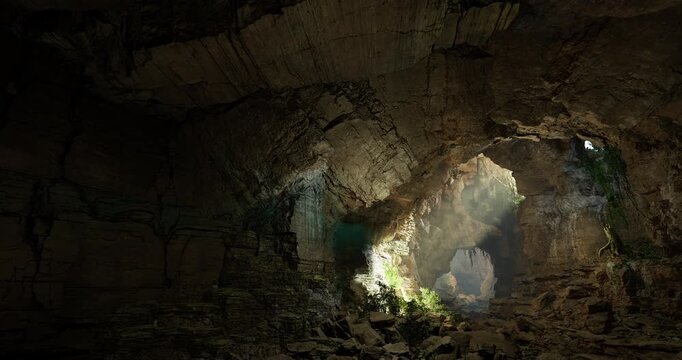 Various rock formations and greenery are visible in a tranquil underground cave. Sunlight streams through openings, illuminating the intricate textures of the walls.