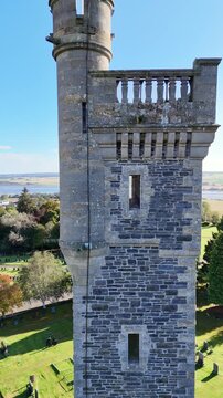 Stunning 4K Aerial Drone Perspective of Macdonald Memorial Tower Dominating Dingwall in the Scottish Highlands &ndash; Iconic Historic Monument Surrounded by Dramatic Highland Scenery

