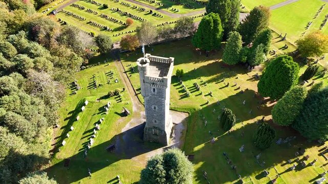 Cinematic Aerial Drone View of Macdonald Memorial Tower Overlooking Dingwall Town in the Scottish Highlands, Scotland &ndash; Historic Landmark Architecture Surrounded by Scenic Landscape and Highland Atmos
