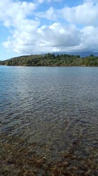 Shoreline on Island of Flowers facing unspoiled Sveti Marko with clear Adriatic water. Reflects eco-conscious tourism branding, Mediterranean destination campaign, and sustainable leisure concept.