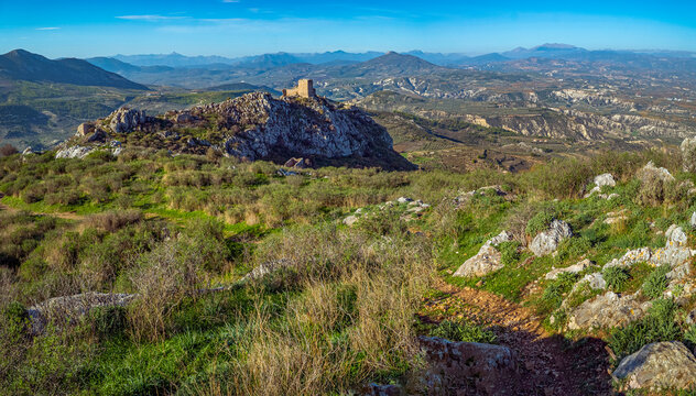 Acrocorinth, Corinth, Greece: Ruins of a castle on a rocky hill overlooking a valley