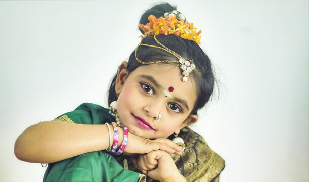 Adorable Child in South Indian Devi Look with Traditional Jewelry and Saree