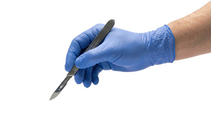 Surgeon hand in blue glove holding medical scalpel