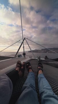 POV sailing on a luxury yacht at dusk in Portugal, Vertical 4K