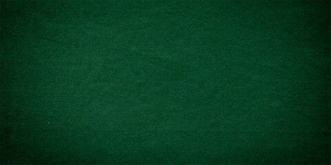 Empty green chalkboard background with a rough grunge texture and old paper pattern for a blank canvas surface backdrop © Kazim