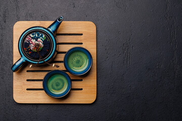 Asian tea ceremony set with teapot and cups